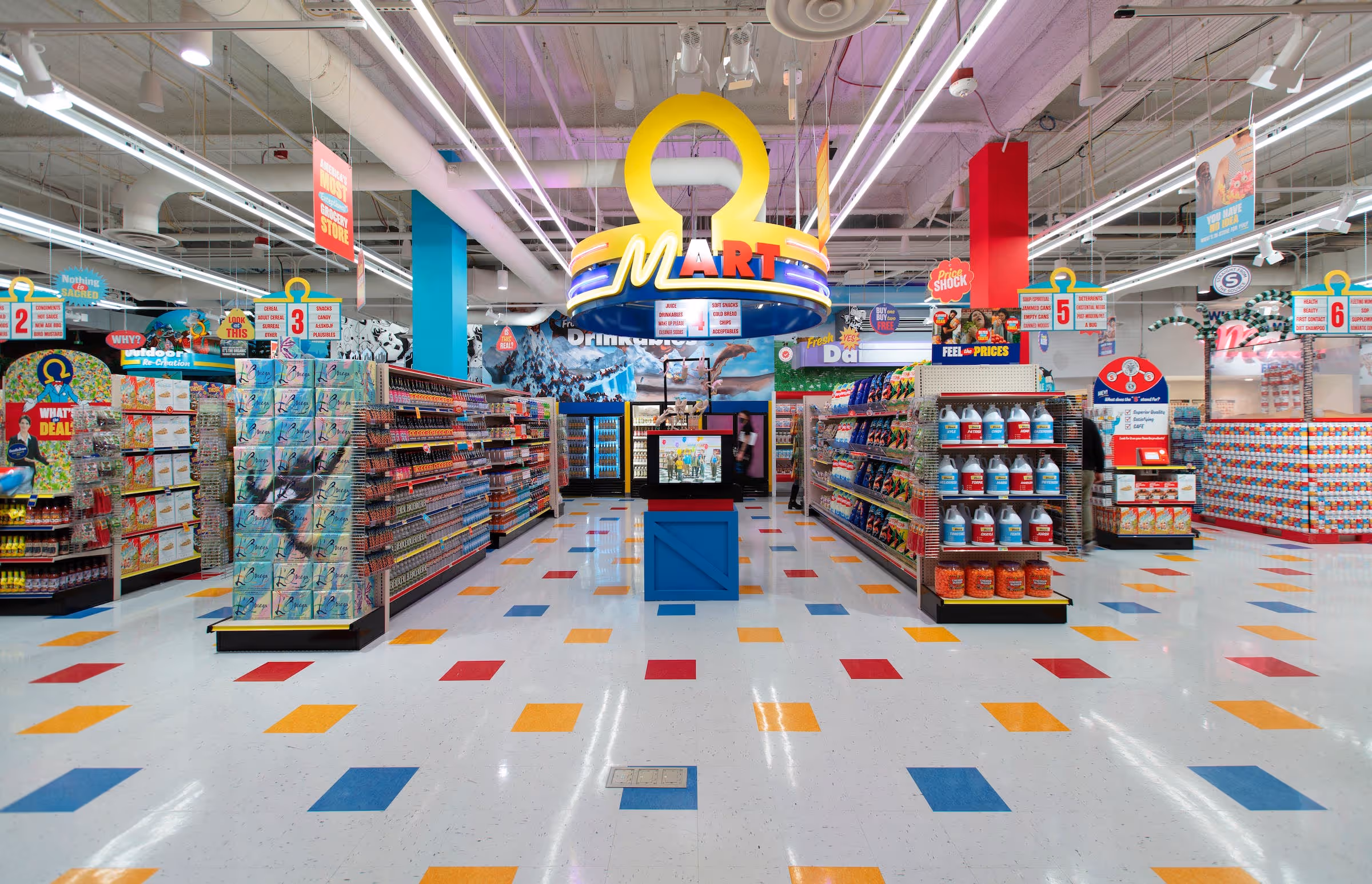 the aisles of Omega Mart lit up by fluorescent lights and a large yellow Omega symbol in the center